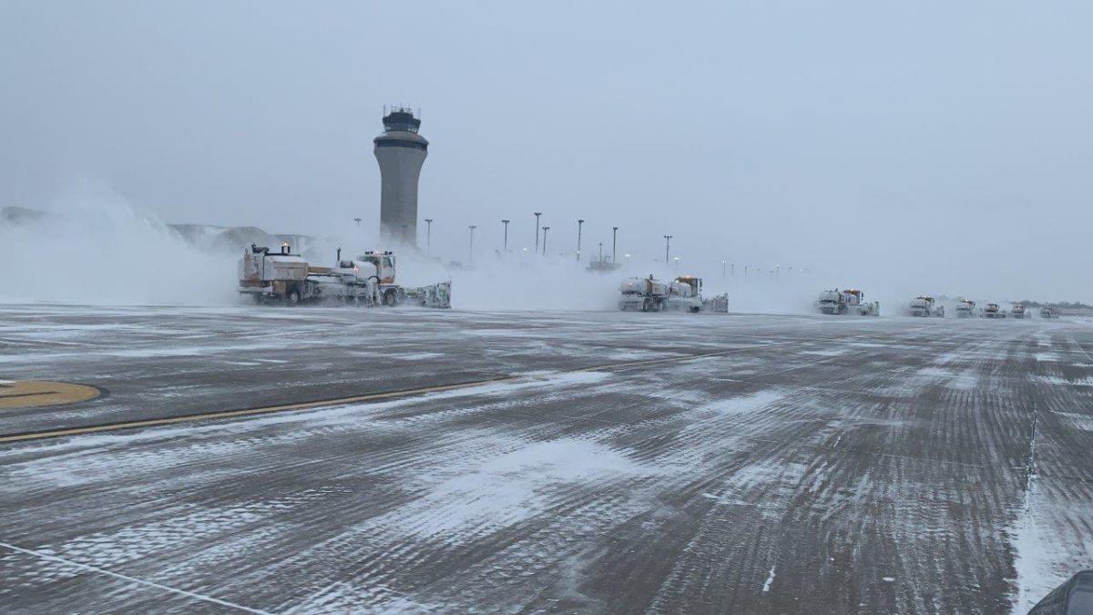 Photo of a snowy runway during a winter storm
