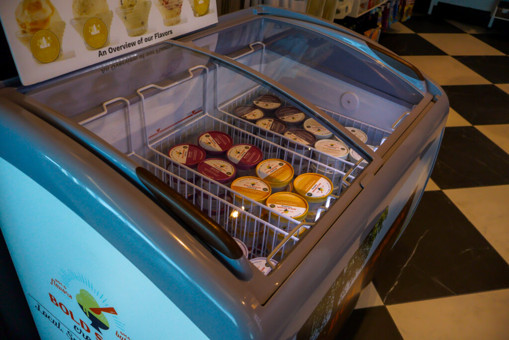 This photo shows the refrigerated display case the houses the Bold Spoon Creamery Ice Creams sold at Lafayette Square Mkt.