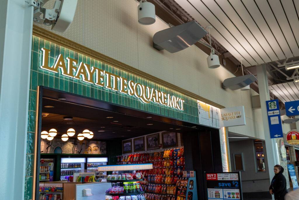 This photo shows the top of the entrance to the Lafayette Square Mkt signage.