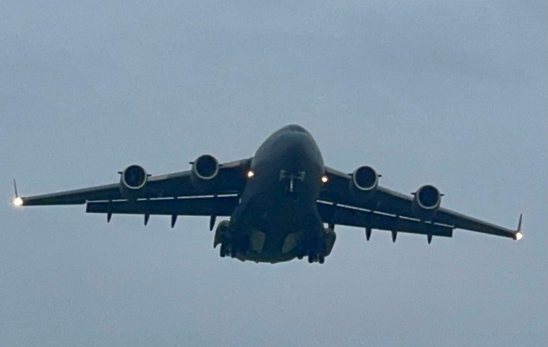 Photo of a Boeing C-17 Globemaster plane in the sky