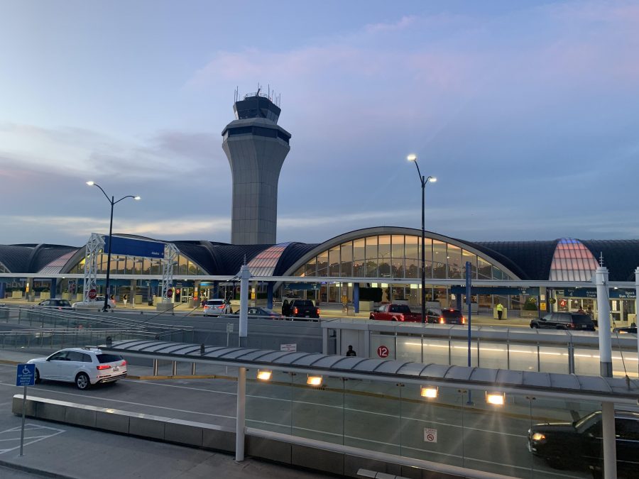Photo of the outside of the STL airport at sunset or sunrise