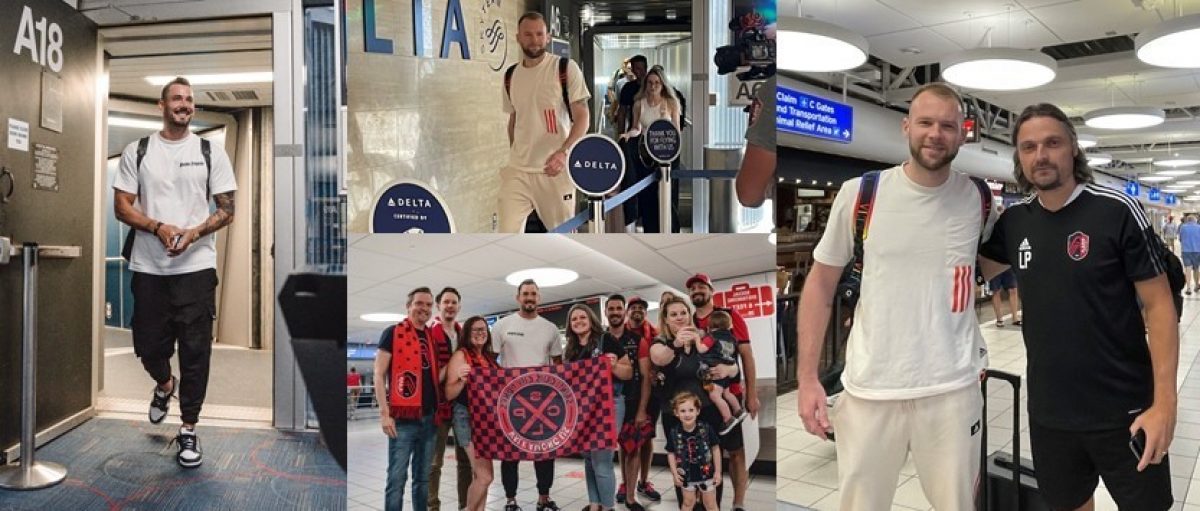 The image is a collage of four photos featuring Roman Burki arriving at the STL airport, interacting with fans, and posing for pictures. In the first photo, he is stepping out of the jet bridge wearing a white t-shirt and black pants, smiling as he walks. The second photo shows Joao Klauss in a cream-colored outfit with a backpack, walking past a Delta sign while a camera captures the moment. The third photo features Klauss standing in a group of excited fans dressed in red and black, holding a banner with a circular logo. In the final photo, he is posing with another man wearing a black sports jersey inside the airport, both smiling at the camera.