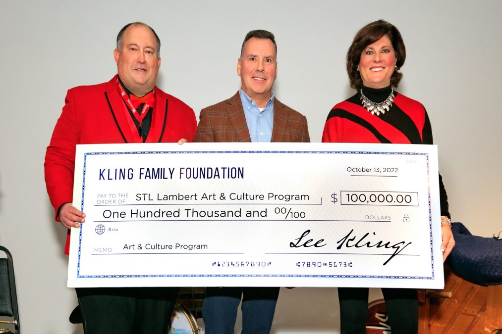 The Kling Family Foundation meets with STL airport director and presents a large check to the STL Lambert Art & Culture Program for $100,000.