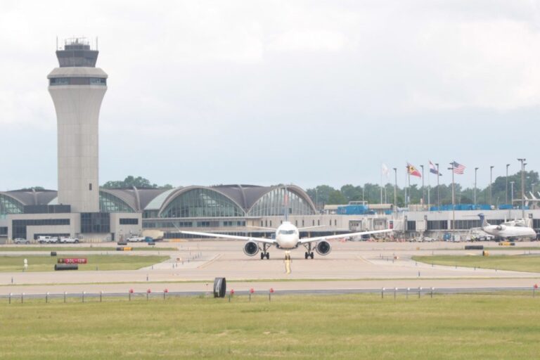 A plane leaves the gates at STL.