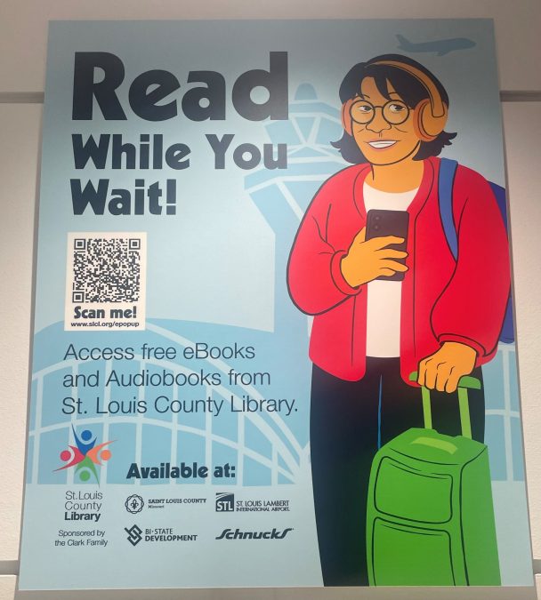 A poster promoting the St. Louis County Library's ePop-Up Library initiative. The text reads "Read While You Wait!" and encourages access to free eBooks and audiobooks. The poster features an illustration of a person with a backpack and suitcase holding a smartphone, along with a QR code for easy access. Logos of partnering organizations, including the St. Louis County Library, St. Louis Lambert International Airport, Saint Louis County, Bi-State Development and Schnucks, are displayed at the bottom.