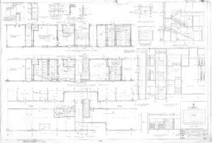 Architectural blueprint showing detailed floor plans, elevations, and section views of a multi-story building, with notes, labels, measurements, and a grid reference in the lower right corner.