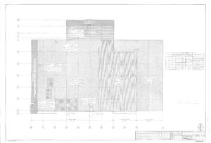 Architectural floor plan drawing showing grid lines, room labels, detailed notes, material types, dimensions, and a legend table. The sheet has a title block in the lower right corner with project and drawing information.