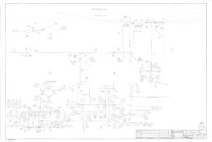 Faint technical site plan drawing showing labeled buildings, roads, and utility lines. The title block and legend appear in the lower right corner, with various notes and symbols scattered throughout the layout.