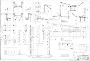 Architectural blueprint with detailed technical drawings, sections, and measurements of building elements, including walls, columns, windows, and roof structures. Various construction notes and scale indicators are visible throughout.