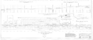 Black and white engineering drawing showing cross-sections and profiles of a railway track, including rail, ballast, road crossing details, slopes, measurements, and labels for track construction and grading.