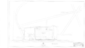 Architectural site plan drawing showing the layout of a building, parking area, and surrounding roads, with labeled structures and pathways, and a title block in the lower right corner.