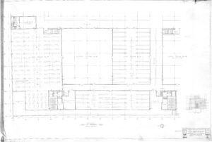 Architectural floor plan drawing showing a large, grid-like layout with labeled areas, stairwells, elevators, and detailed room sections; includes a small location inset at the bottom right and scale information.