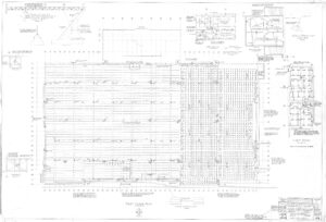 Architectural blueprint showing a detailed first floor plan with structural grids, notes, measurements, columns, and sectional diagrams; includes various technical details and annotations throughout.