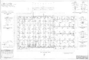 Architectural blueprint showing a detailed floor plan with labeled columns, gridlines, measurements, and structural notes; includes several enlarged technical drawings of column connections and a title block in the lower right corner.