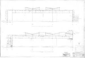 Architectural drawing showing two cross sections of an industrial building, labeled “Hydro Assembly Bay” and “Final Assembly Bay,” with detailed structural elements, roof design, and measurements.