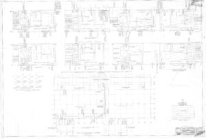 Faded architectural blueprint showing multiple detailed floor plans and elevation views of a building, including room layouts, measurements, notations, and a grid reference in the lower right corner.
