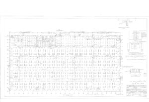 Architectural blueprint of a large rectangular floor plan, labeled “San Marco Exhibition Bldg.,” showing a grid of columns, multiple rooms, stairwells, and various technical construction notes.