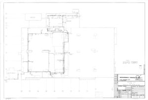 Architectural floor plan drawing by McDonnell Douglas showing building layout, rooms, walls, doors, notes, and a title block at the lower right with project details and scale. The plan includes multiple labeled sections and exterior markers.