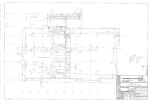 Architectural blueprint of a building floor plan showing rooms, doors, walls, dimensions, annotations, and symbols, with the McDonnell Douglas logo and a title block at the bottom right corner containing project details.