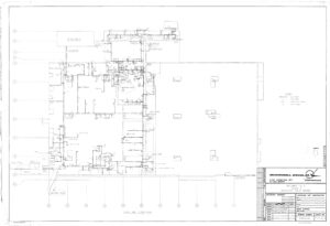 Architectural floor plan drawing showing detailed layout of rooms, walls, doors, and mechanical systems for a building. Title block at lower right reads “McDonnell Douglas,” with project information and revision notes.