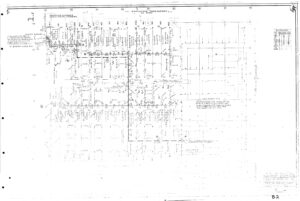Faint, black-and-white engineering or architectural blueprint featuring a grid layout, technical labels, measurements, and construction notes. The drawing is densely detailed and includes several columns of text and numerical data.