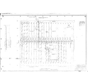 Faded technical drawing of a structural framing plan for a building, showing columns, beams, grids, notes, and dimensions. The drawing has handwritten annotations and a title block in the lower right corner.