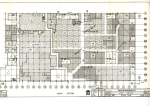 Black and white architectural floor plan of a building’s south section, showing labeled rooms, the cafeteria, doors, windows, measurements, and various patterns representing different areas. Title block reads McDonnell, Main Factory Level 1.