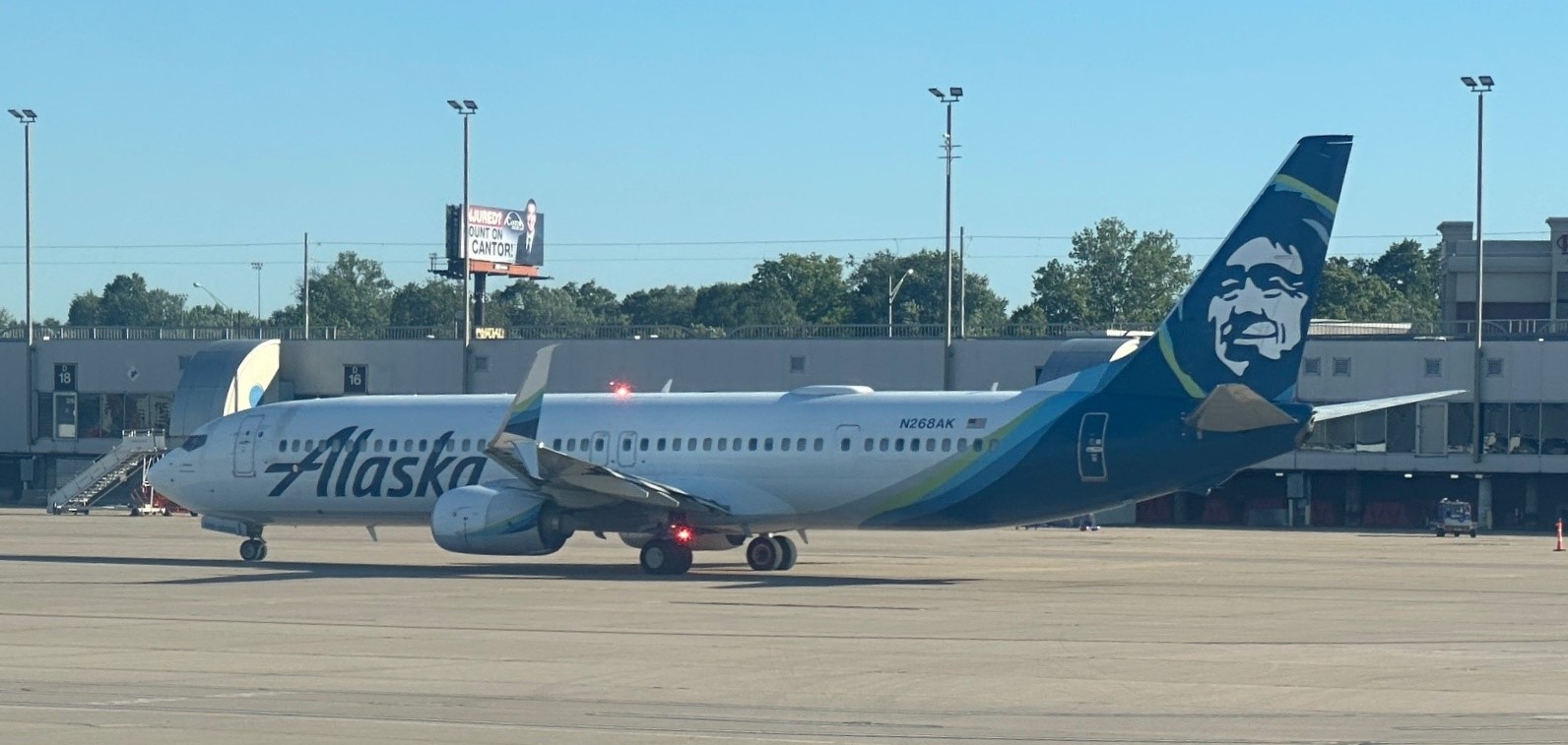 This Alaska Airlines' Boeing 737-9 max is moving from STL's C Concourse to the airport's runway.
