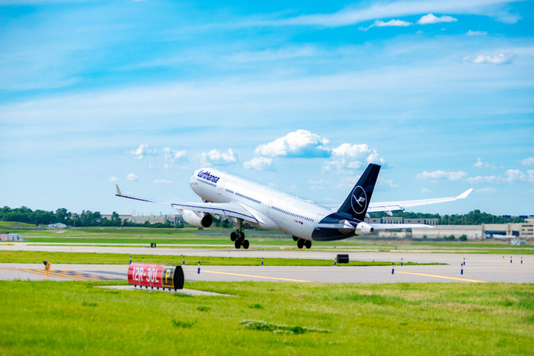 This photo shows a Lufthansa Airlines' Airbus A330-300 taking off to the west from St. Louis Lambert International Airport on Runway 12R-30L, With wheels up the plane is only seconds into its flight.
