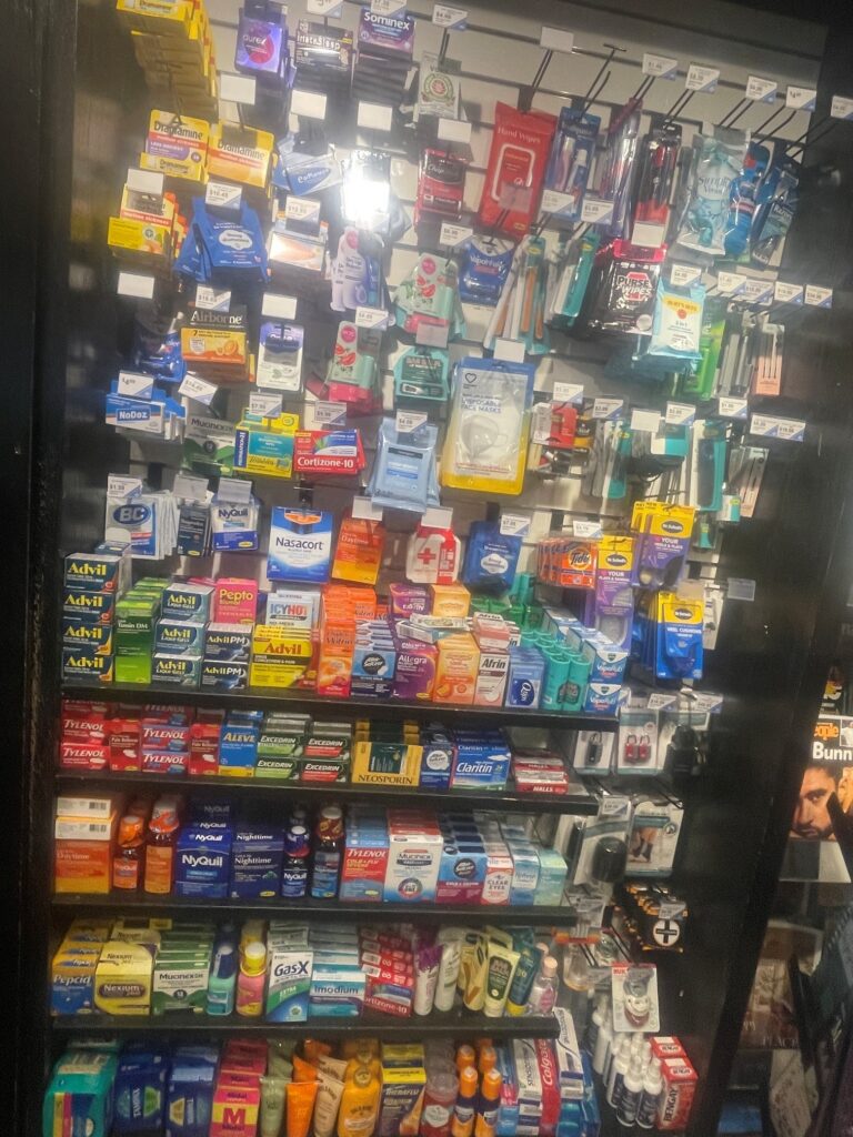 This photo shows the wide variety of health products carried on the shelves of the Riverbend market. The display case has just under 100 items.